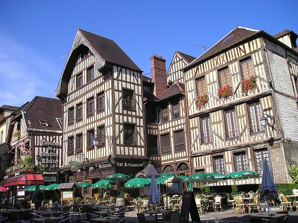 Half-timbered medieval buildings in Troyes, France, the city widely credited as the birthplace of the troy ounce (ozt) used to measure gold bars and coins today
